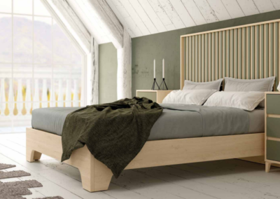 Dormitorio verty en color roble combinado con verde oliva. Mesitas con patas piramidales y bañera forma.